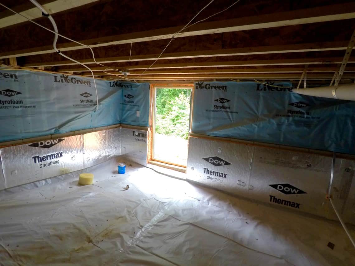 Finished sealed crawl space encapsulation with liner and insulated foundation walls in Raleigh NC