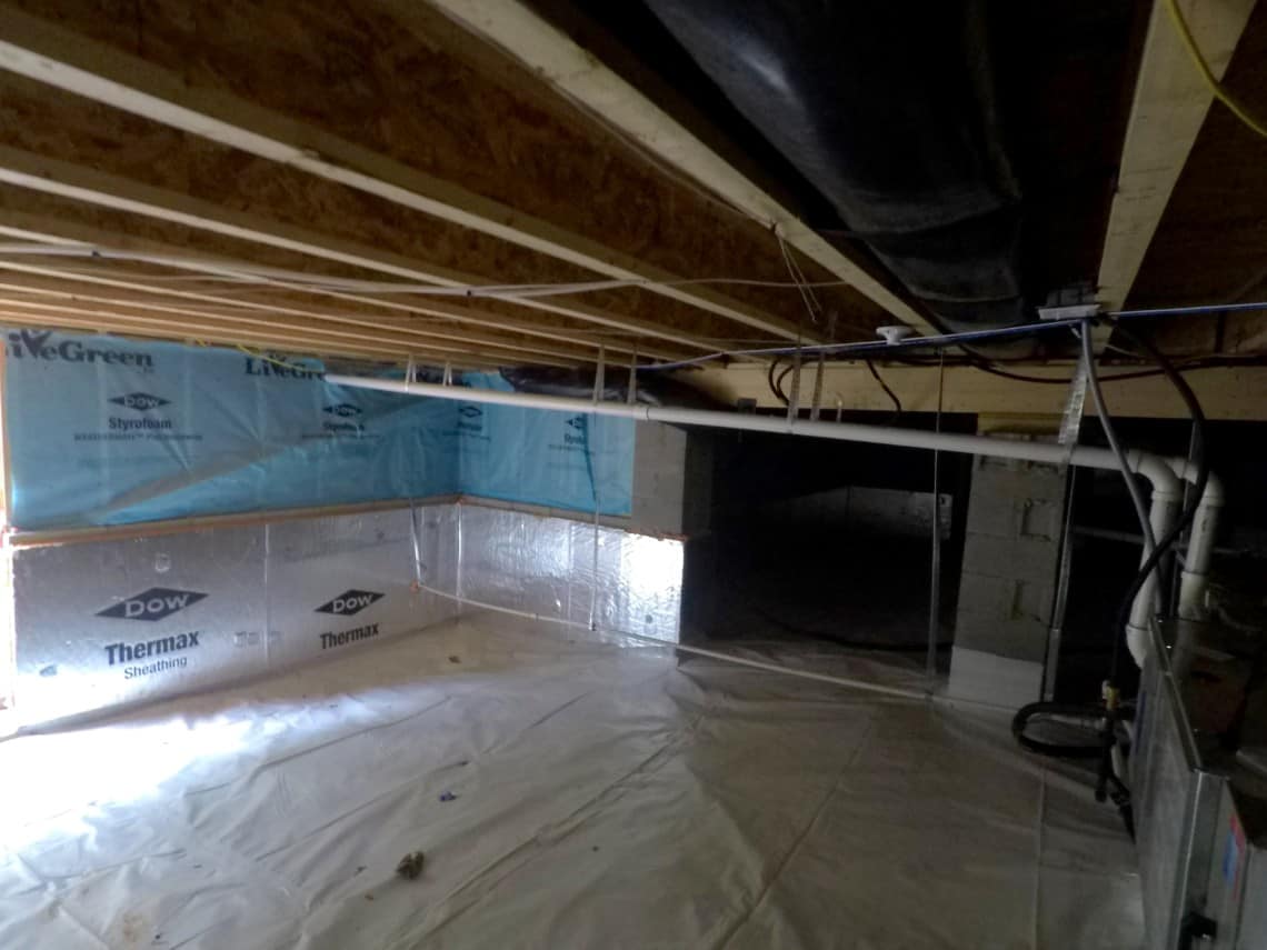 Completed crawl space encapsulation in a North Carolina home with sealed liner and insulated walls